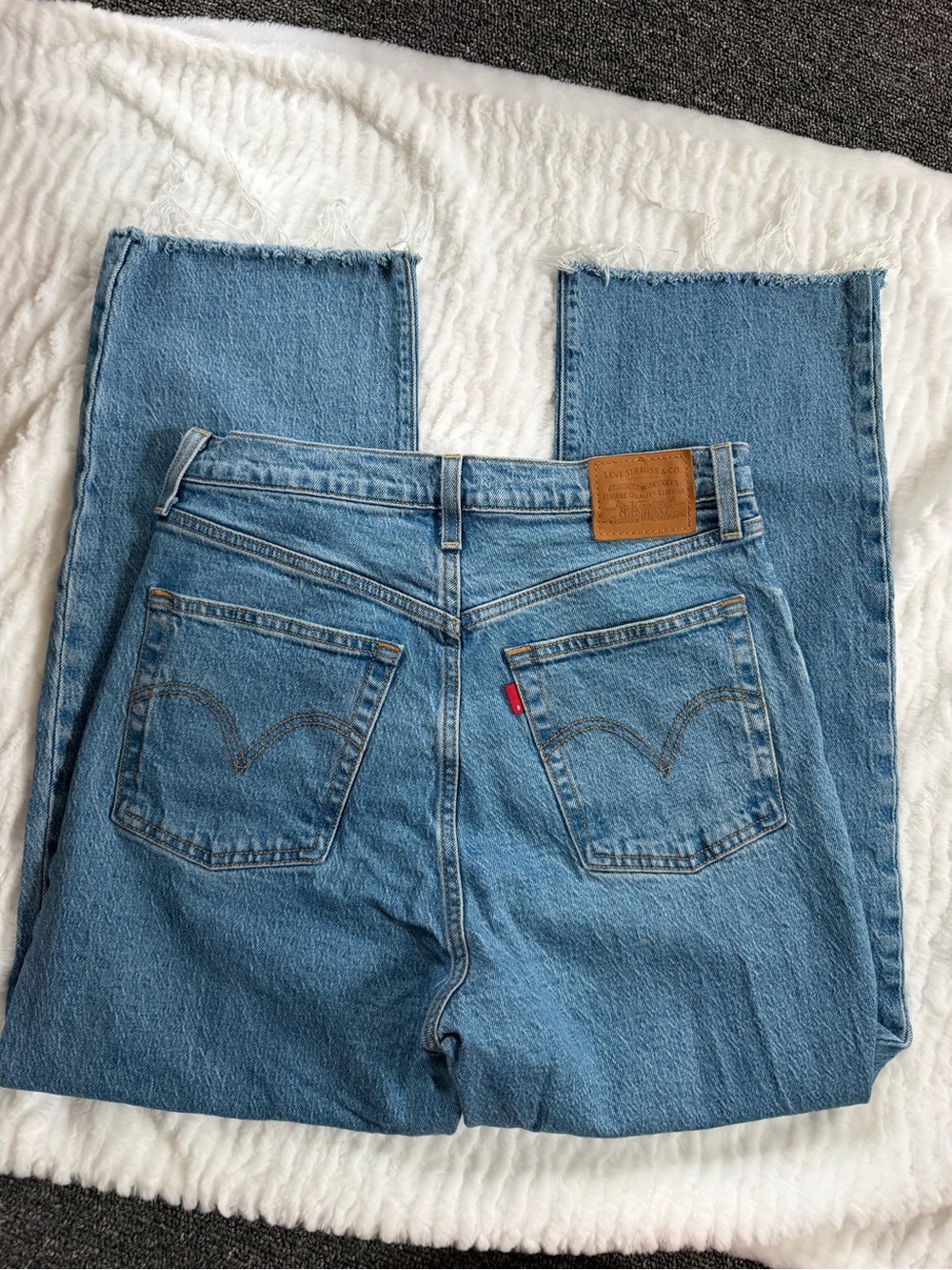 Levi's Light Blue Denim Jeans with Frayed Hem
